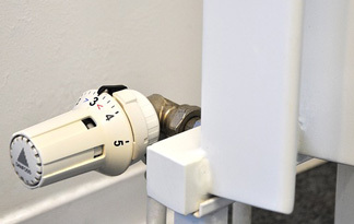 Bild: Heizungs-Thermostat und Montage
