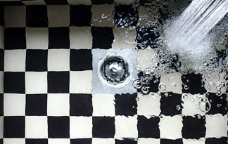 Bild: Waschbecken-Abfluss mit Garnitur